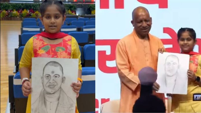 सीएम-योगी-का-स्केच-बनाकर-लाई-बच्ची,-मुख्यमंत्री-ने-स्टेज-पर-बुलाया,-दिया-ऑटोग्राफ